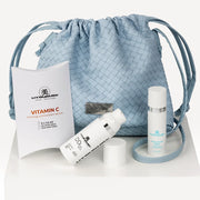 Komplekts Micro Spicule DD Cream ar kosmētikas somiņu | FW26